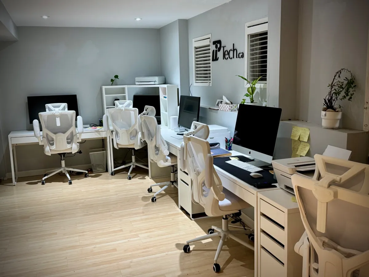 PiTech open workspace with white desks and the PiTech logo at 1925 Russet Way
