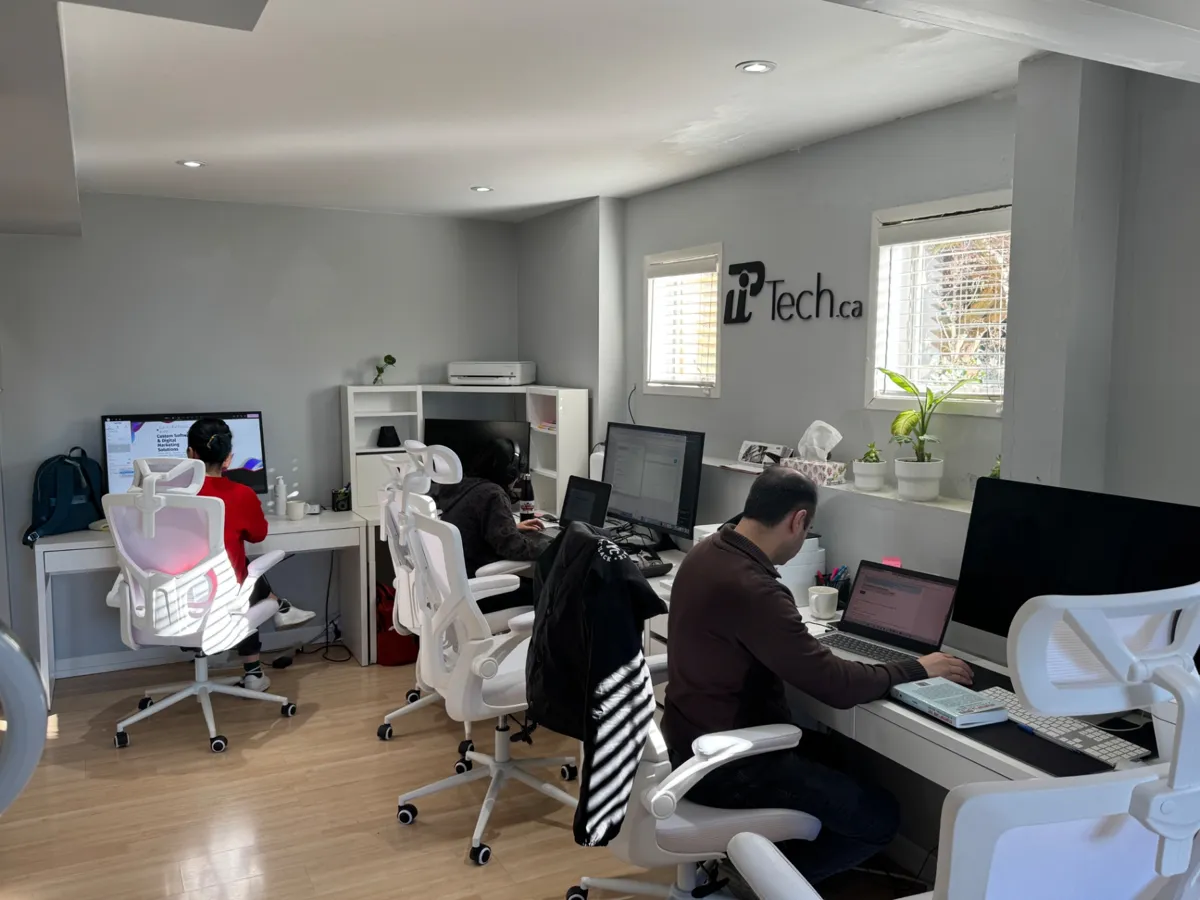 PiTech engineers working at their desks in the 1925 Russet Way office